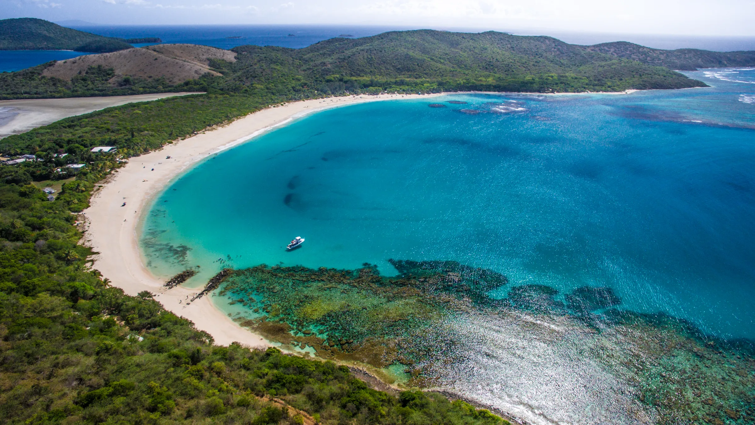 boat in a cove on the beach